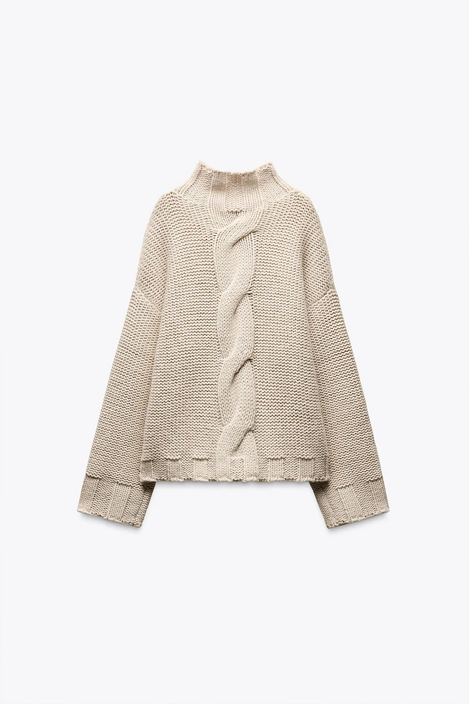 PULL EN MAILLE À TORSADES