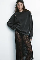 JUPE ASYMÉTRIQUE AVEC DENTELLE