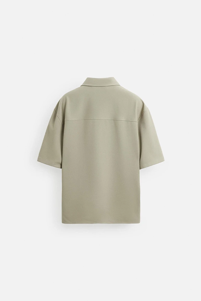 TECHNICAL ZIP POLO SHIRT