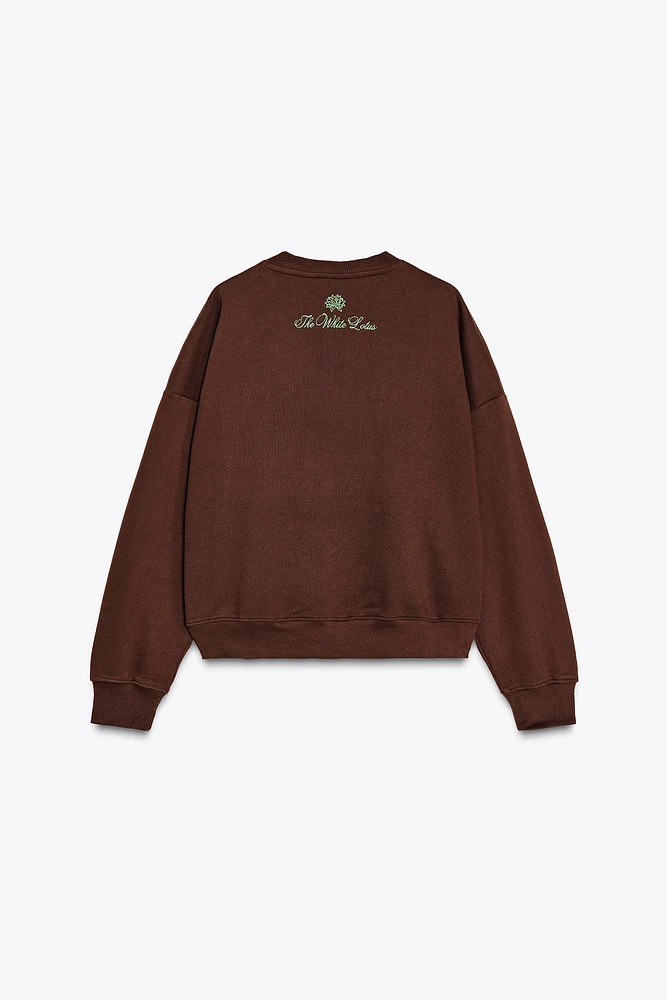 THE WHITE LOTUS FLEECE SWEATSHIRT