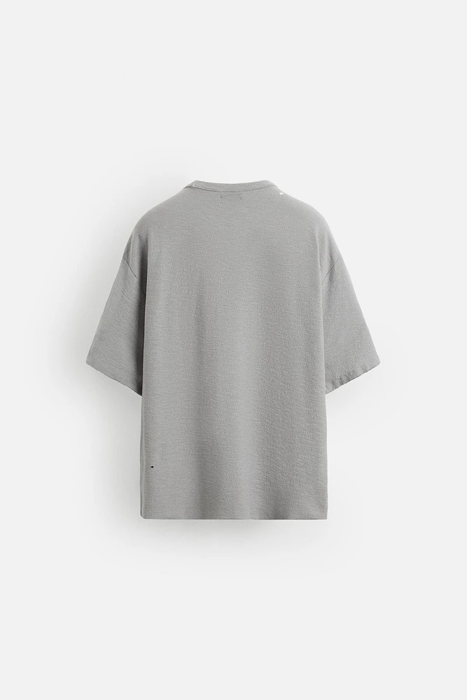 T-SHIRT EN MAILLE IMPRIMÉ DÉLAVÉ