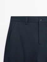 Slim fit cotton blend trousers.