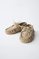 FRINGED LEATHER LOAFERS