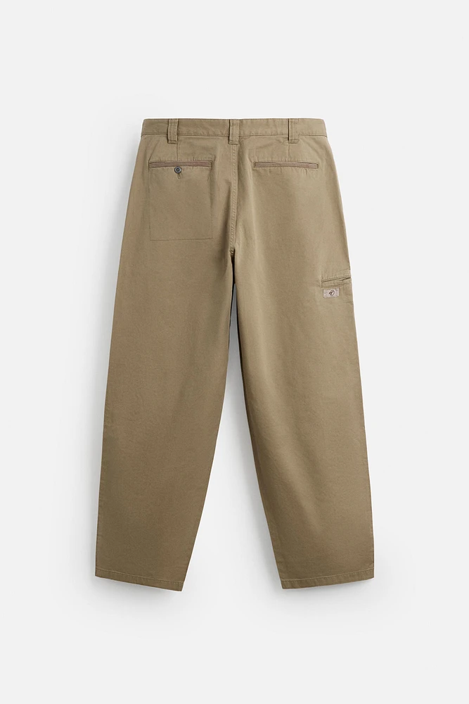 PANTALON RELAXED FIT À PLIS