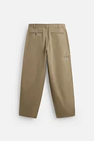 PANTALON RELAXED FIT À PLIS