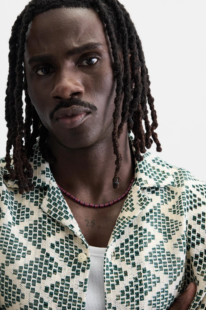 CHEMISE STRUCTURÉE AJOURÉE