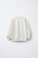 ROMANTIC BOW SWEATSHIRT