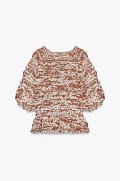 TOP EN MAILLE COMBINÉE PÉPLUM