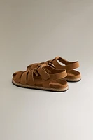 LEATHER CAGE SANDALS
