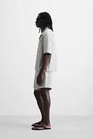 CHEMISE TECHNIQUE RELAXED FIT