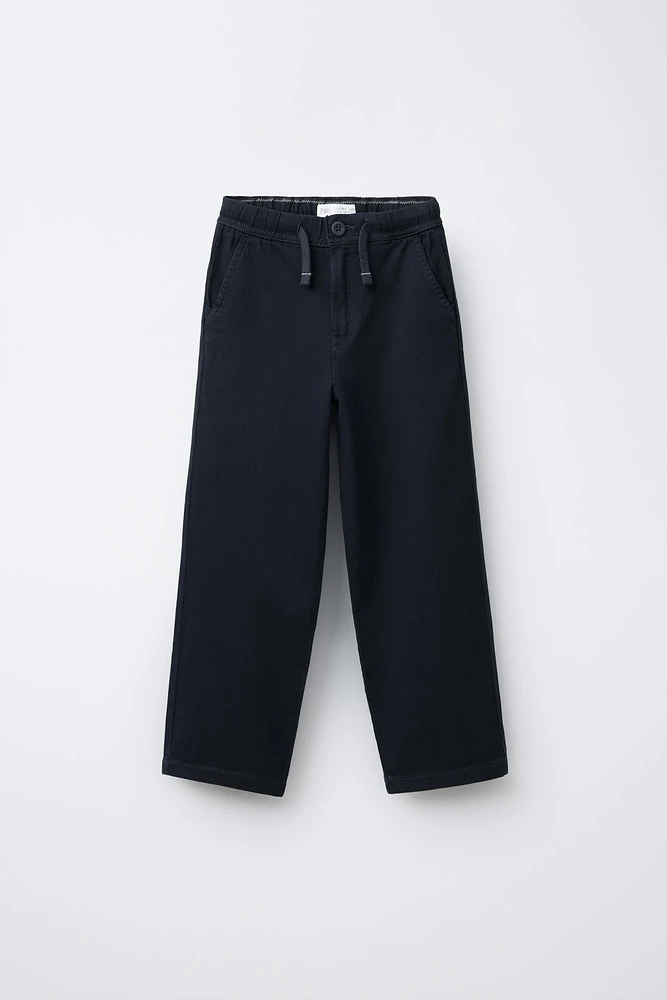 TEXTURED STRETCH PANTS