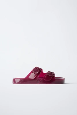 BUCKLED POOL SLIDES