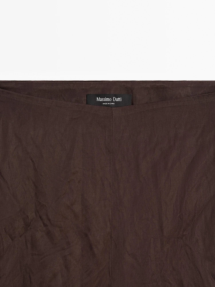 Capri trousers with blonde lace detail