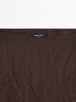 Capri trousers with blonde lace detail