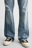 RIPPED FLARE FIT JEANS