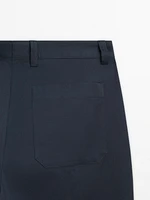 Slim fit cotton blend trousers.