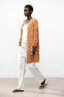 MANTEAU OUVERT EN MACRAMÉ