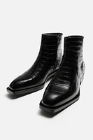 EMBOSSED LEATHER BOOTS