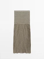 Long pleated skirt with flecked detail
