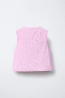 TEXTURED VEST WITH HEART POCKETS