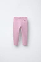 LABEL DETAIL RIBBED LEGGINGS