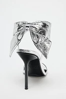 METALLIC EFFECT BOW SANDALS