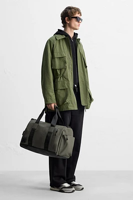 RUBBERIZED TRAVEL BAG
