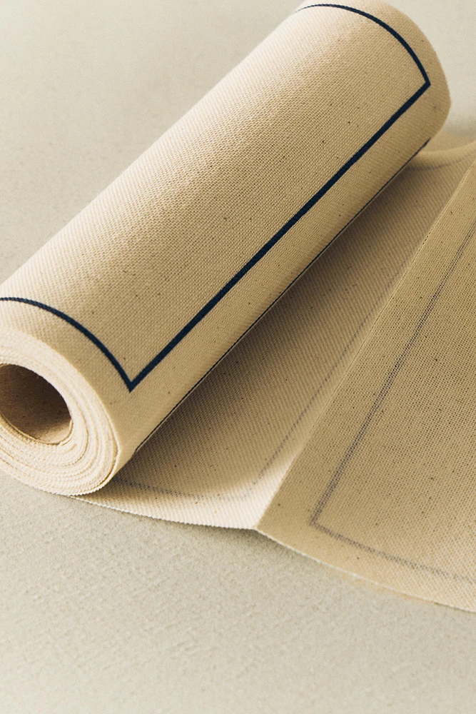 ROLL OF COTTON NAPKINS WITH BORDER (SET OF 20)