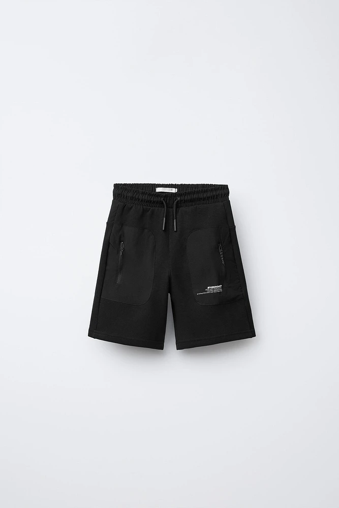 BERMUDA SPORT EN MATIÈRES VARIÉES