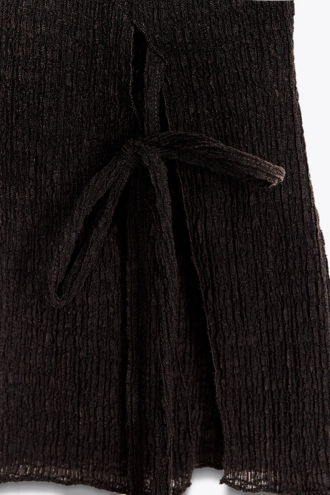TOP À TEXTURE AVEC CEINTURE