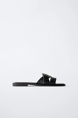 STUDDED CROSSOVER FLAT SANDALS
