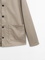 Short jacket with leather collar detail