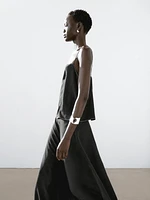 Strappy top with contrast topstitching