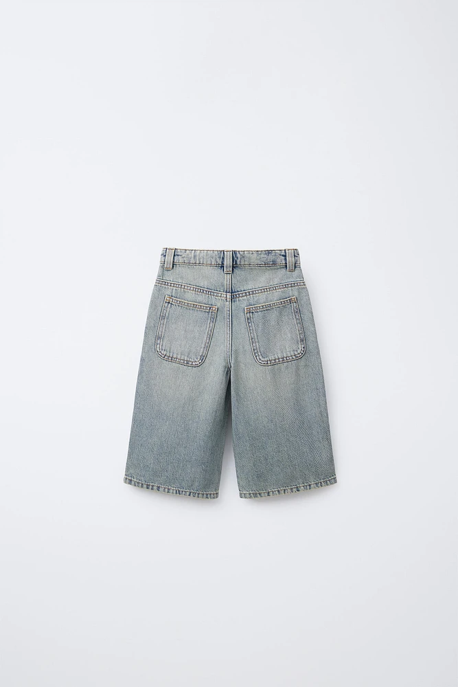 WASHED-EFFECT DENIM LONG SHORTS