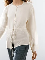 Flowing semi-sheer blouse with ties