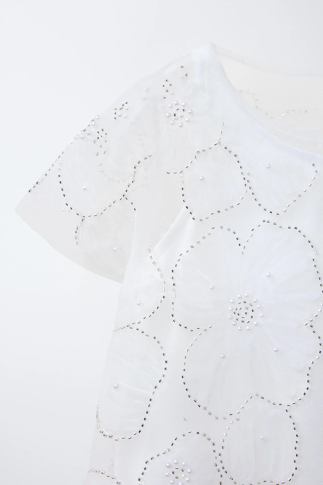 ROBE EN TULLE AVEC PERLES FANTAISIE