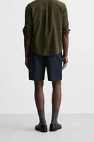 PLEATED REGULAR FIT BERMUDA SHORTS