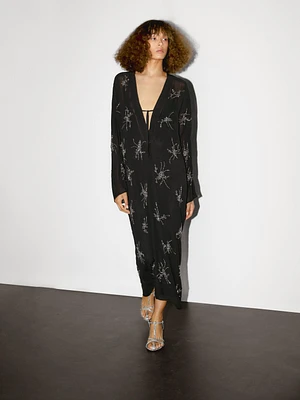 Robe midi fluide avec broderies