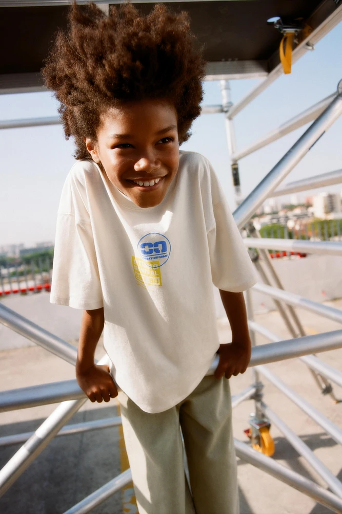 RAISED GRAPHIC T-SHIRT
