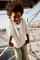 RAISED GRAPHIC T-SHIRT