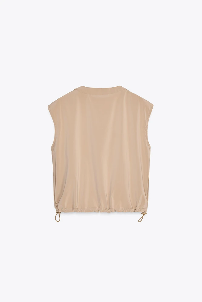 SHORT ELASTIC HEM VEST