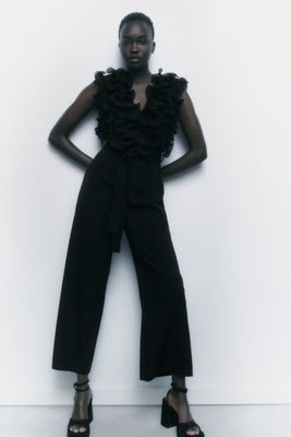 BELTED RUFFLED JUMPSUIT