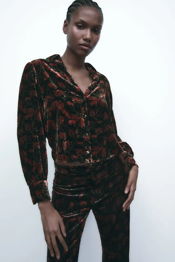 Animal-print velvet blouse