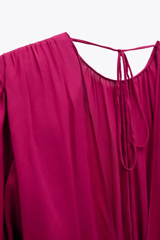 SEMI-SHEER BLOUSE WITH SHOULDER PADS