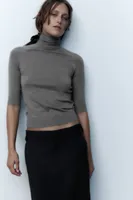 HIGH COLLAR KNIT SWEATER