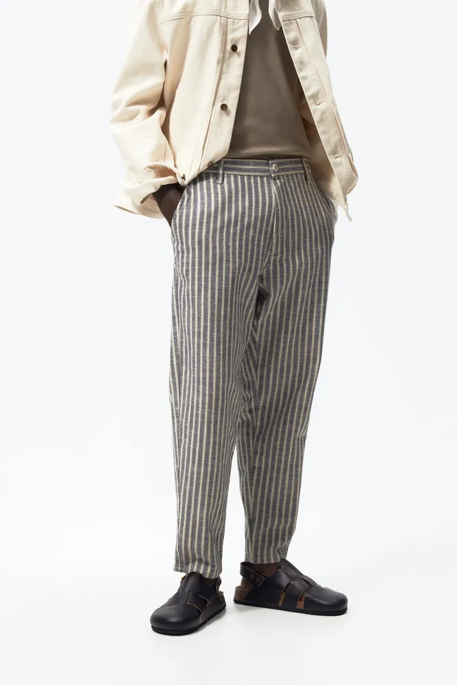 STRIPED TAPERED FIT PANTS