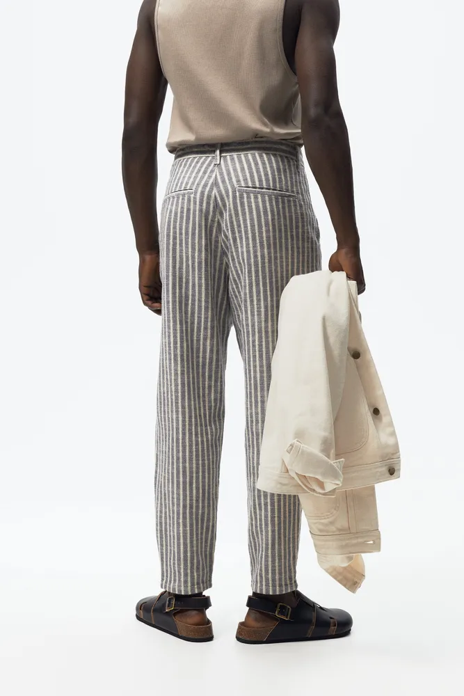 STRIPED TAPERED FIT PANTS