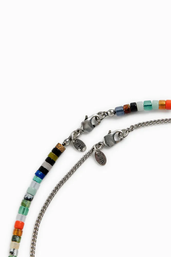 PACK OF CONTRASTING NECKLACES