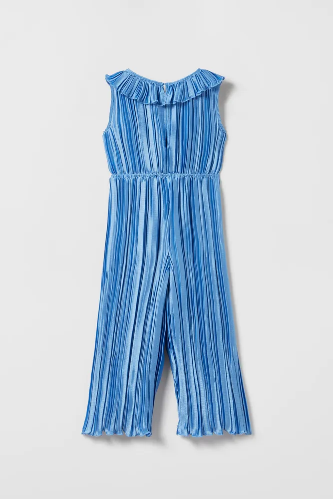 PLEATED JUMPSUIT WITH RUFFLES