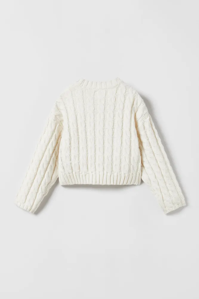 CABLE KNIT SWEATER